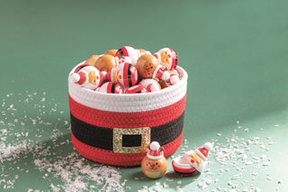 Mud Pie holiday lip gloss in Santa and Reindeer shapes—festive, child-safe stocking stuffers with sweet shimmer and twist-off tops.