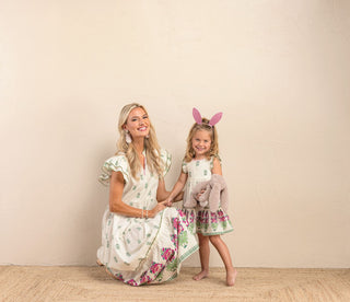 Mud Pie girls ivory block print dress with ruffled shoulders and flounce hem, matching mommy and me Easter outfit.