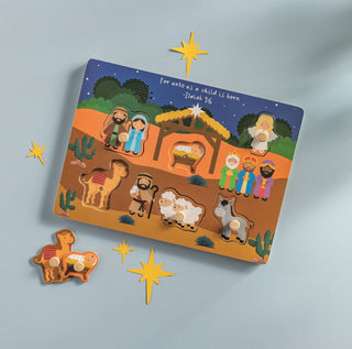 Mud Pie Nativity sound puzzle with peg pieces that play sounds—features Holy Family, animals, angel, and Wise Men.
