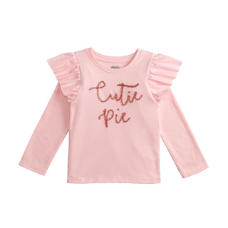 Girls long sleeve tees with ruffle shoulders and tinsel wording—available in ivory “Pumpkin Spice” or pink “Cutie Pie” for fall charm.