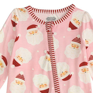 Pink footed sleeper with glow-in-the-dark Santa print and striped trim—made from soft bamboo knit for cozy Christmas bedtime comfort.