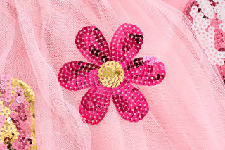 Mud Pie pink Western tutus with sequin boots, hats, and flowers—available in gingham or tulle for your little cowgirl's dress-up and play.