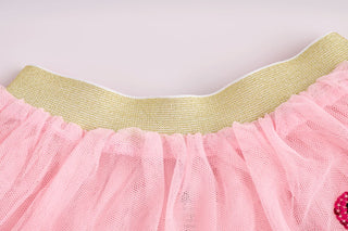 Mud Pie pink Western tutus with sequin boots, hats, and flowers—available in gingham or tulle for your little cowgirl's dress-up and play.