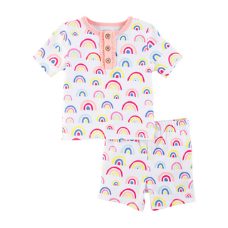 Girls’ rainbow pajama set with ruffle button placket and pull-on shorts. Soft cotton-spandex blend perfect for bedtime comfort.
