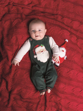 Green corduroy longall with appliquéd Santa and plaid buttons, paired with a cream waffle knit top—classic baby Christmas outfit.