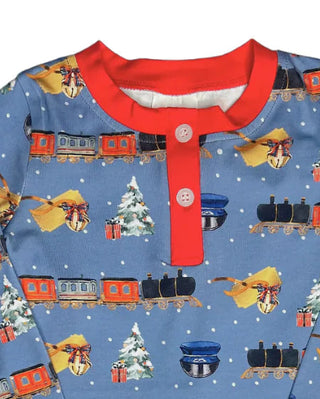 Sage & Lilly navy pajama set with holiday train print featuring trees, bells,  and conductor caps with red cuffs, and button placket.