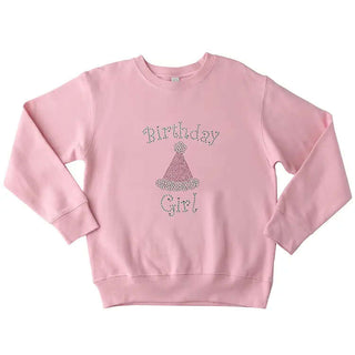 Pink girls’ birthday sweatshirt with rhinestone studs that say “Birthday Girl” and feature a sparkling party hat design.
