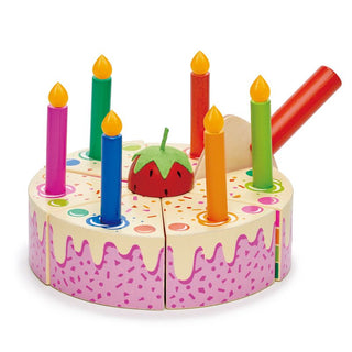 Wooden birthday cake toy with rainbow slices, candles, and slicer—perfect for pretend play and learning through celebration.