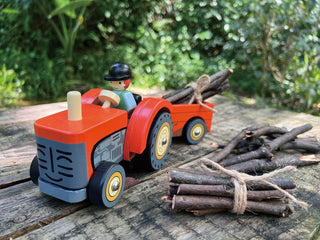 Wooden farm tractor playset with trailer, farmer figure, hay bales, horse, and goose—perfect for pretend play and farm adventures.