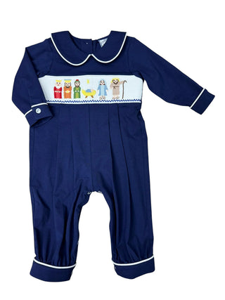 Three Sisters Navy Nativity Boys Bubble Romper with nativity embroidery, piped collar and cuffs, on navy knit fabric.