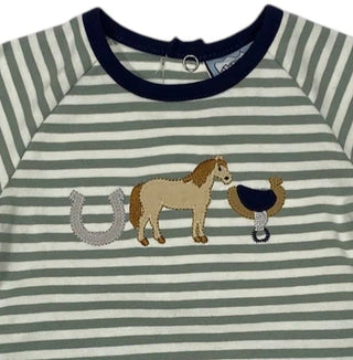 Close-up of a gray and white striped shirt featuring an embroidered horse, horseshoe, and saddle.