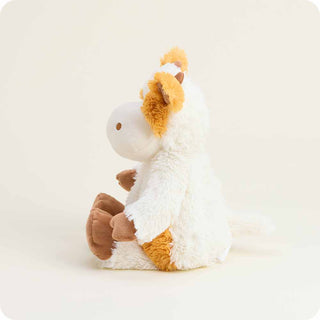 Side profile of Warmies Pumpkin Spice Cow with floppy ears, brown hooves, and cozy plush design with lavender scent.