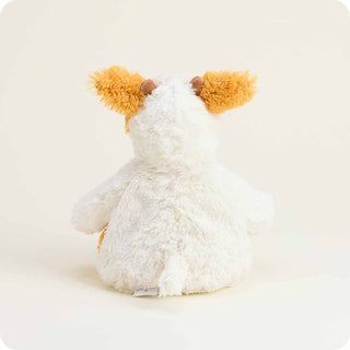Back view of Warmies Pumpkin Spice Cow plush toy showing fluffy cream body and pumpkin spice details for hot or cold therapy