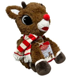 Warmies Rudolph plush toy with red nose and striped holiday scarf sitting upright.