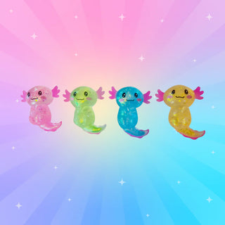 Colorful lineup of Squishy Axolotl toys in multiple colors with sparkles, perfect for collectors and sensory toy lovers.