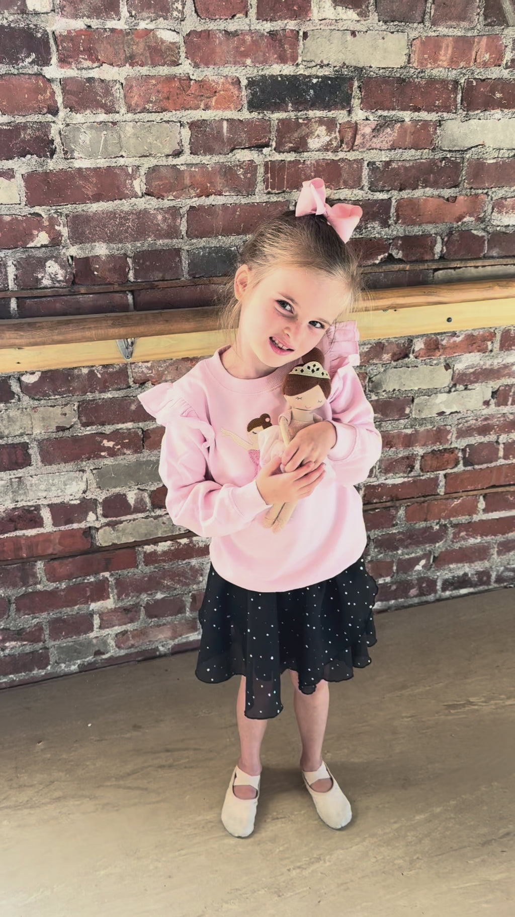 Mud Pie ballerina doll in pink tutu, video of little girl in ballet outfit hugging and loving her soft plush ballerina toy.